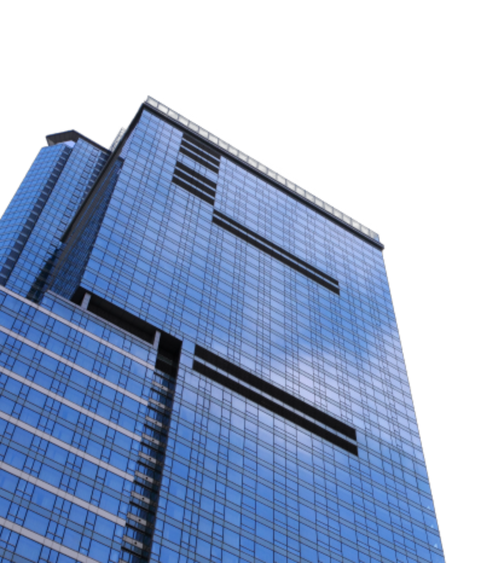Imagen de un edificio de empresas visto desde abajo.